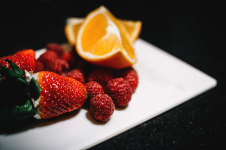orange,  strawberry,  raspberry,  plate,  fruit,  food,  dark,  background,  fresh,  sliced