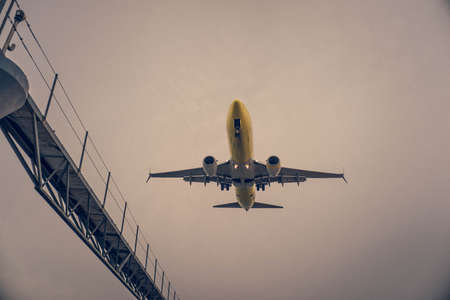 plane,  flying,  overhead,  cloudy,  sky,  flight,  fly,  transport,  yellow,  carrier,  passenger