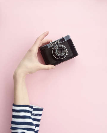 girl,  camera,  pink background,  minimal,  techology,  woman,  hand,  people