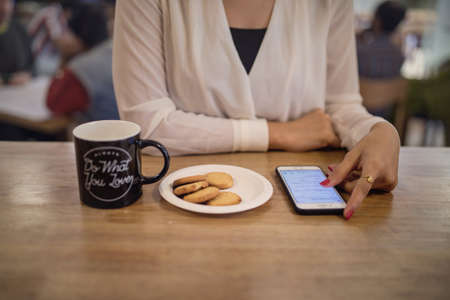 woman,  cafe,  phone,  browsing,  snack,  cookies,  coffee,  cup,  breakfast,  reading,  person, ...