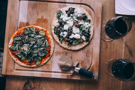 pizza,  wine,  rustic food,  wine glasses,   food,  red wine,  wood,  pizza slicer,  comfort food, ...