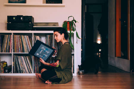 woman,  sitting,  reading,  records,  vinyl,  music,  home,  casual,  tattoo,  female,  person, ...