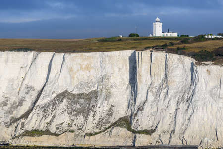 lighthouse,  cliff,  landscape,  beacon,  beach,  shore,  coast,  sky,  rocks,  nature,  landmark, ...
