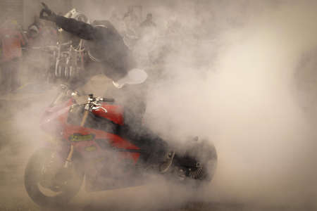 Man Riding on Red and Black Sports Bike