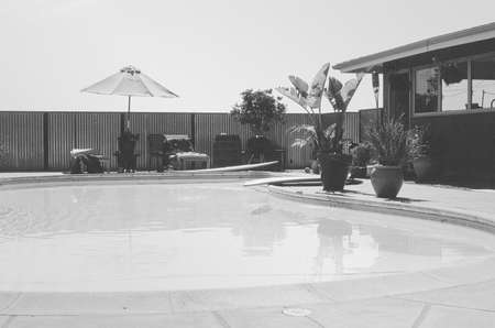 Grayscale Photography of Swimming Pool