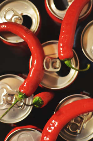 Four Red Chili on Top of Cans