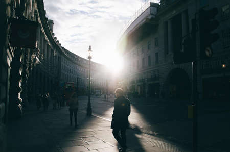 Man Walking on Walkway
