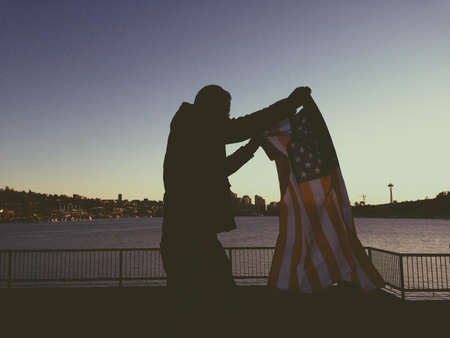 Man Holding Flag of Usa