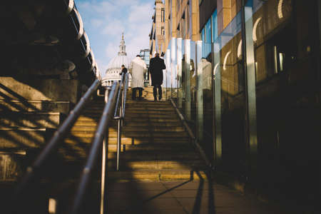 2 People Walking Up on Stairs