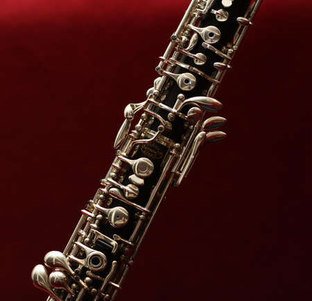 Gray Instrument on Red Textile