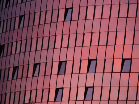Black Mirror Mounted on Red Wall Building