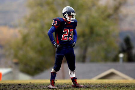 Football Player Wearing No. 23 Jersey Standing on Field