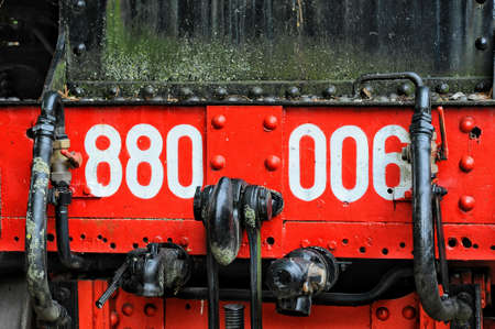 Red and Black Vehicle With 880 006