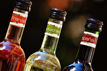 Shallow Focus Photofrapy of France Leutschien Espana Labeled Glass Bottles