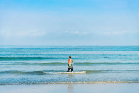 Man Standing at the Beach