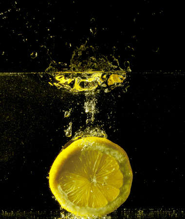 Yellow Lime Submerged in Water