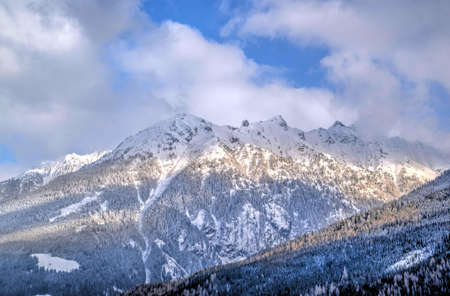 Brown Rock Formation Covered With White Snow