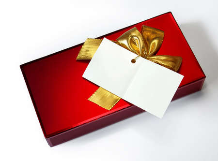 Red gift box with blank note card and a golden lace