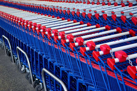 Detail of a rows of supermarket karts tidy put together.の写真素材