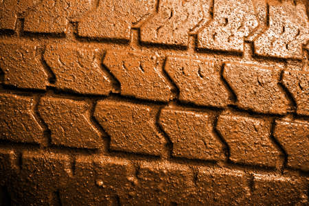Close-up of a muddy  tire surfaceの写真素材