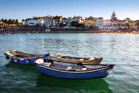 Touristic town of Cascais in Portugal with two row boatsの写真素材