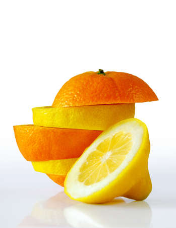 Composition of a pile of juicy orange and lemon slicesの写真素材