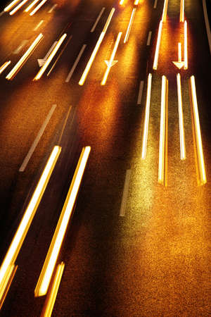 High traffic road with automobile light trails in a rush-hour