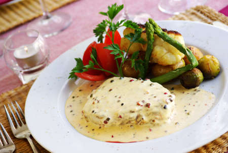 Italian dish of beef and vegetables with pepper sauceの写真素材