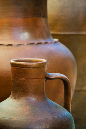 Background image with details of three clay pots in a rowの写真素材