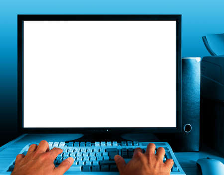 Close up of blank monitor and male hands over a computer keyboard の写真素材