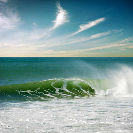 Beautiful seascape with a single perfect waveの写真素材