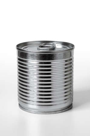 Single can of conserved food over white background