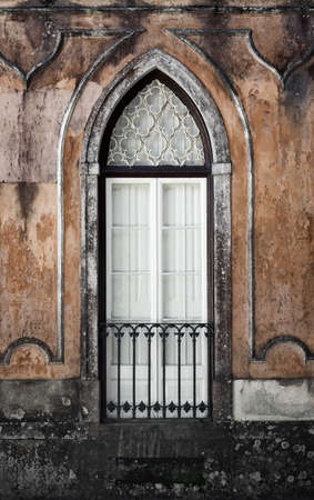 Gothic window of an old romantic palace in Sintra, Portugal