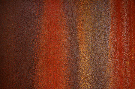 Background of a bumpy and rusty old iron surface 