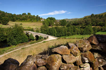 Portuguese countryside landscape with an ancient roman bridge