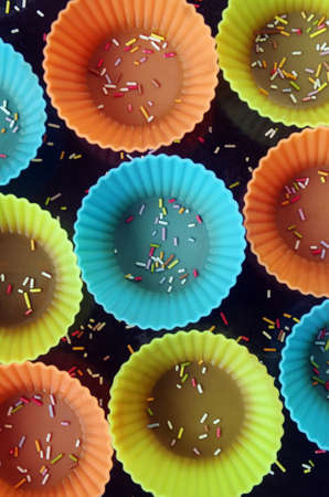 Top view of a group of colorful silicon cupcake formsの写真素材