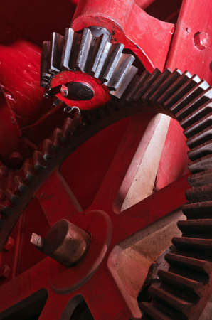 closeup on machanical gear wheels and old industrial machine partsの写真素材