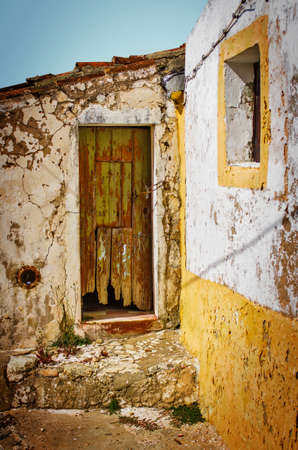Detail of door and window in an old house ruinの写真素材