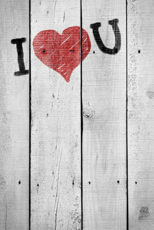 Background of old, cracked wooden planks painted whiteの写真素材