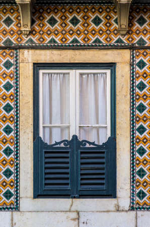 Typical window of old architecture in Lisbon Portugalの写真素材