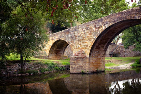 Detail of old roman bridge in the town Gois, Portugalの写真素材