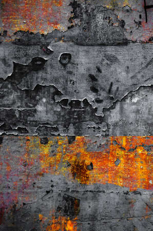 Old colorful rusty metallic surface with peeling paint and scratches