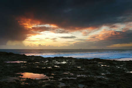 Carcavelos beach in Portugal in a cloudy winter eveningの写真素材