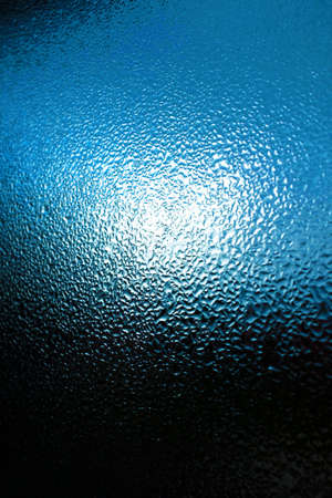 background image of glass window covered with moistureの写真素材