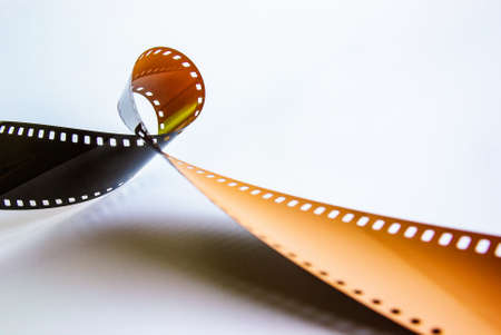 Detail of roll of undeveloped photographic film out of the canister