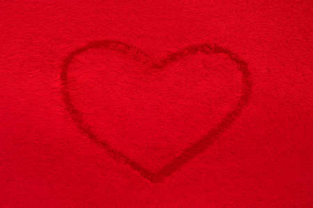 Red Heart on a Red Backgroundの写真素材