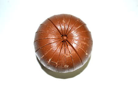 top of chocolate sphere isolated on white background close upの写真素材