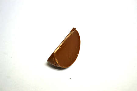 piece of chocolate isolated on white background close upの写真素材