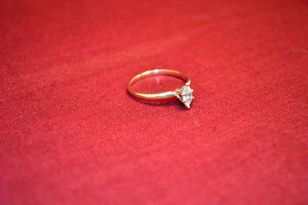 jewellery isolated on red background close upの写真素材