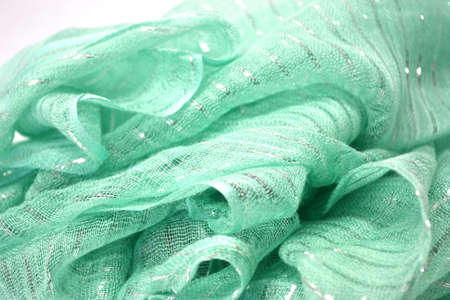 green woven scarf close upの写真素材